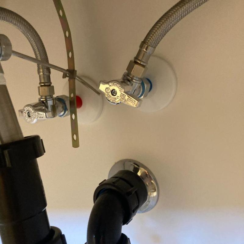 Angle stop valves and supply lines under sink plumbing