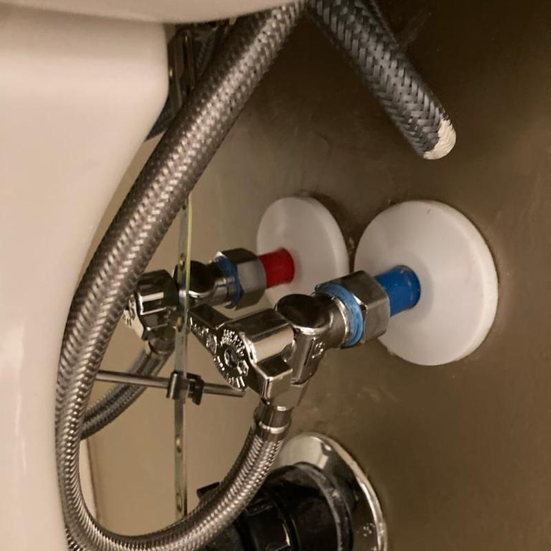 Angle stop valves and supply lines under sink in San Tan Valley
