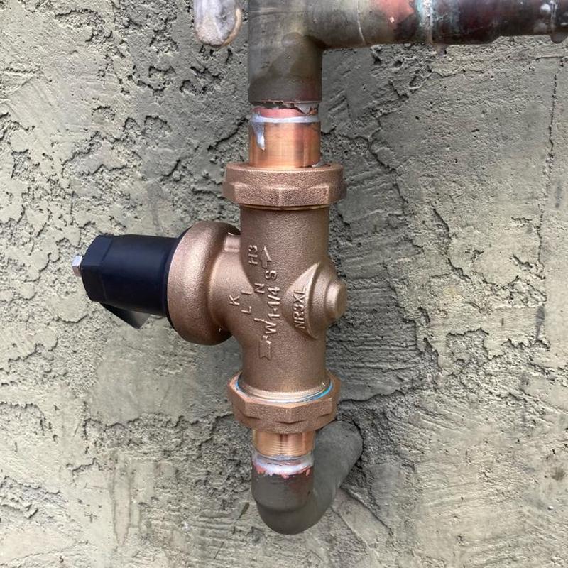 Pressure reducing valve installed on copper piping