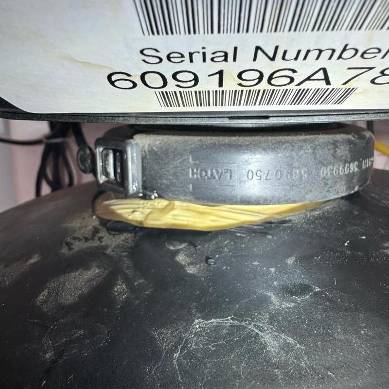 Water softener clamp on cracked tank repair area