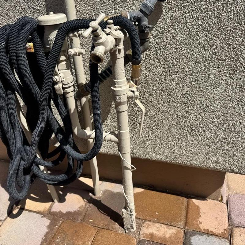 Pressure reducing valve and water line with hose wraps