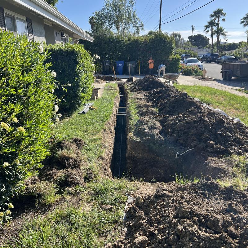 Kitchen and laundry drainage trench excavation in yard