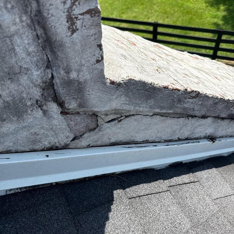 Chimney masonry cracks and deteriorating sealant