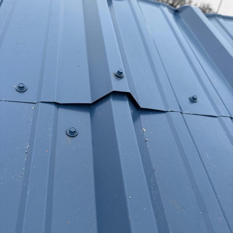 Metal roofing seams and fasteners with hail damage
