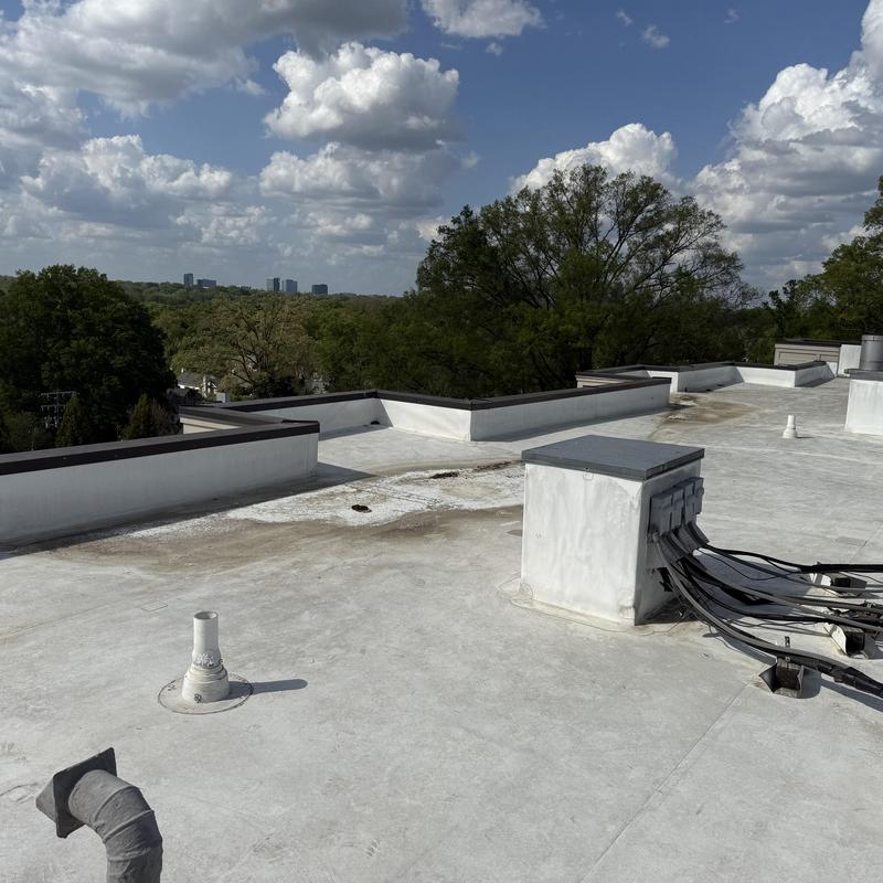 Flat roof membrane with electrical conduit enclosure