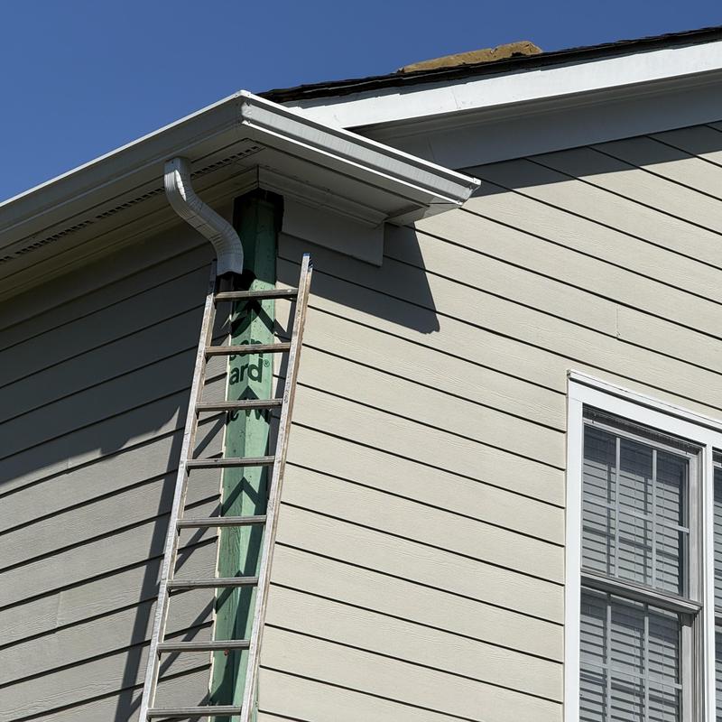 PVC corner post replacement with ladder on siding exterior PVC corner post replacement with ladder on siding exterior