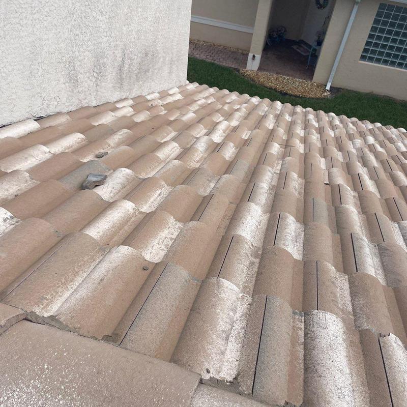 Concrete tile roof with cracking and movement damage