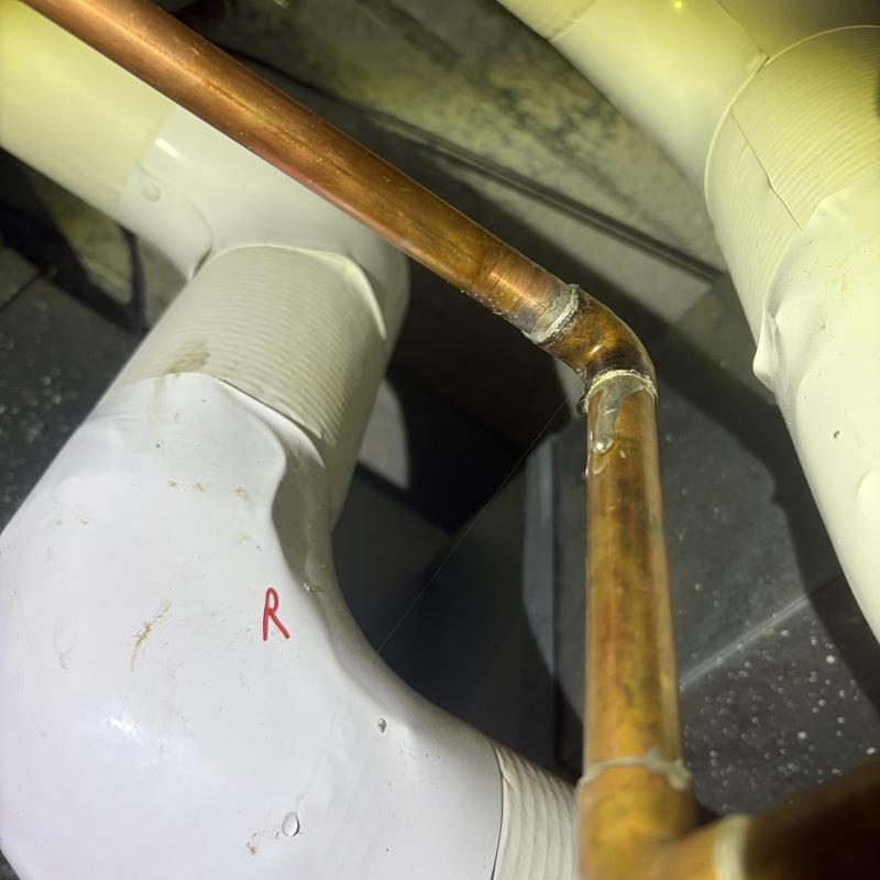 Copper condensate drain line and PVC piping connection