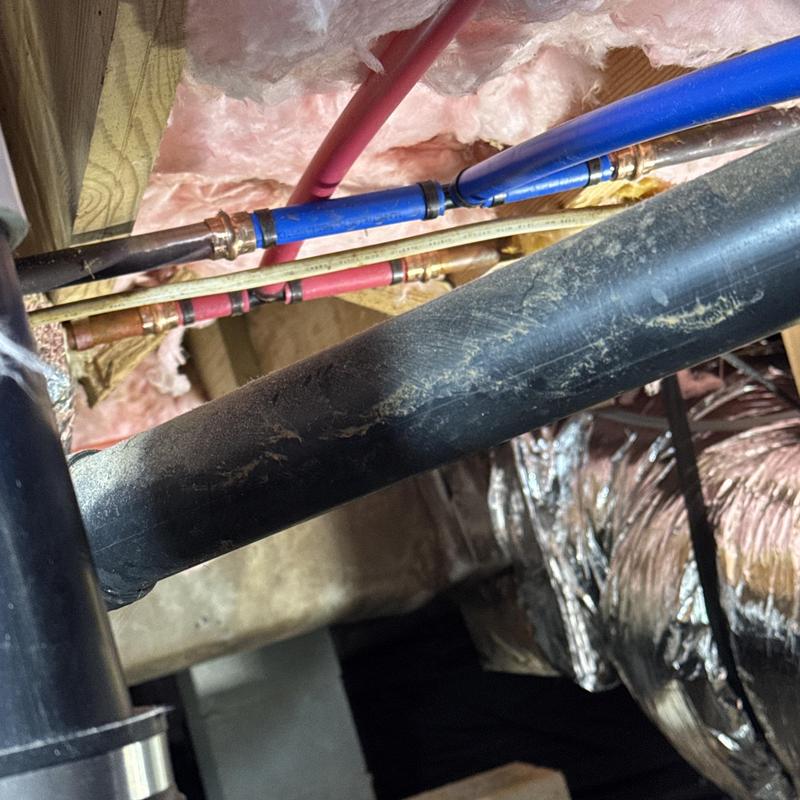 Water heater supply lines with insulation and fittings