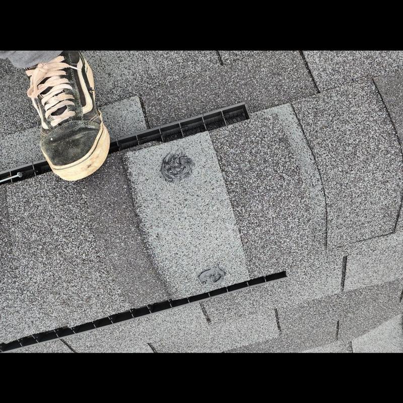 Roof shingle replacement with nail sealant and shoe