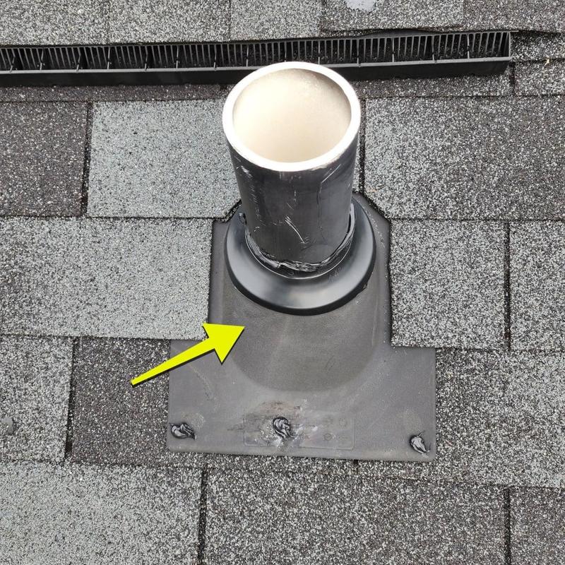 Pipe boot with new seal on shingle roof