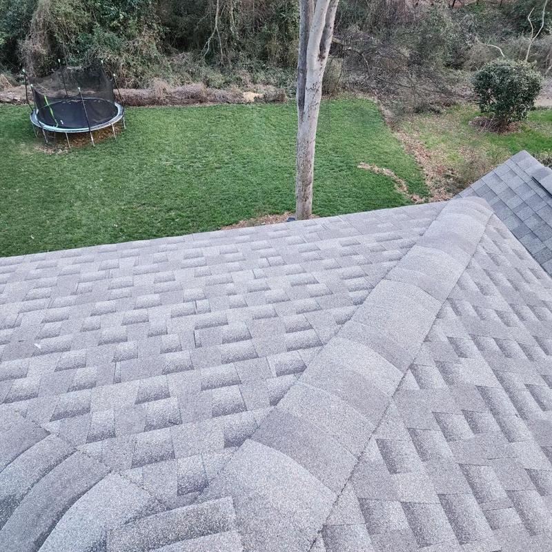 Architectural shingle roof with ridge cap installation