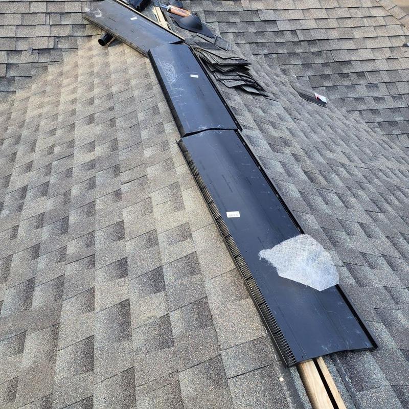 Architectural shingle roof with ridge vent installation