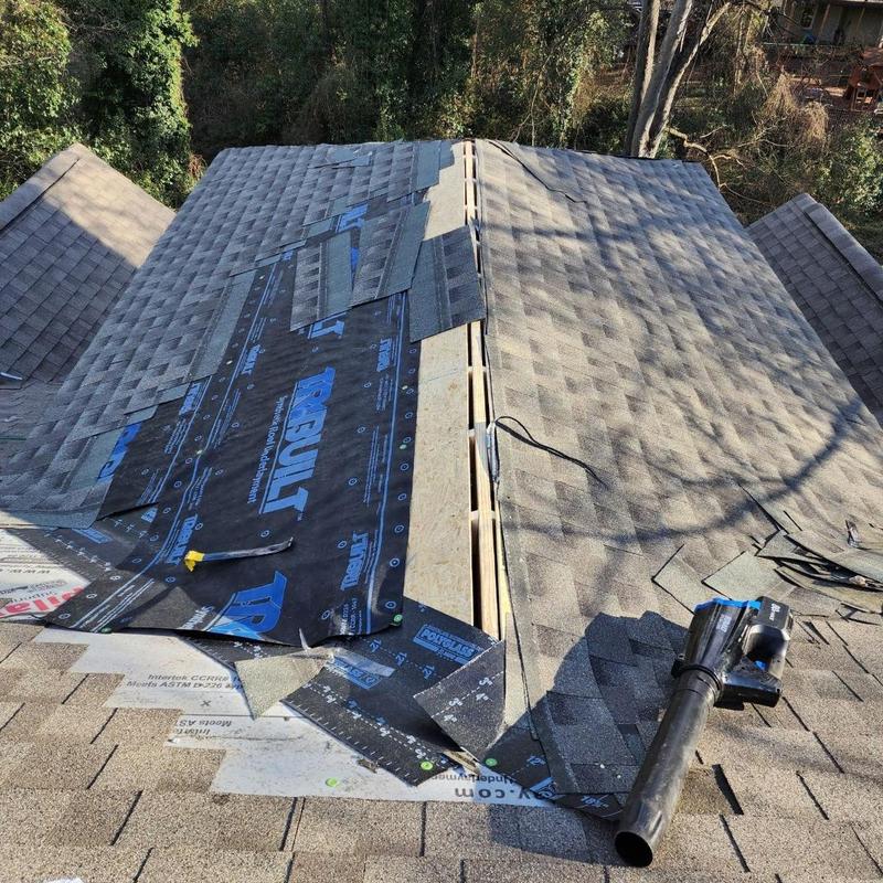 Architectural shingle roofing installation in progress