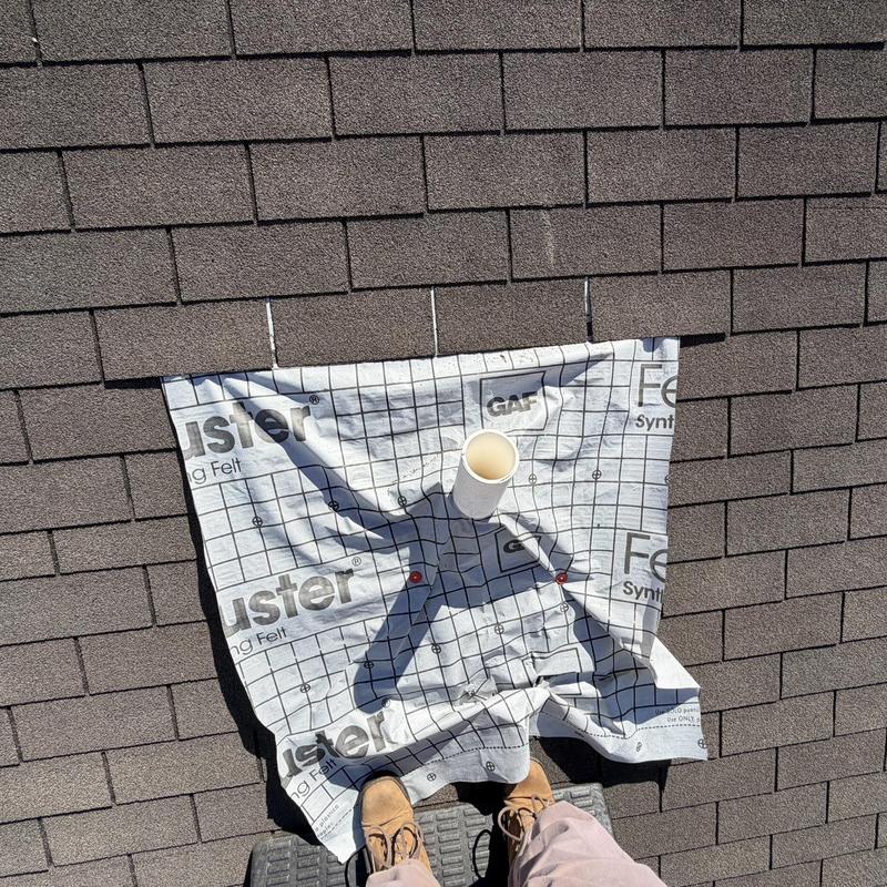 Pipe boot with synthetic underlayment on shingle roof