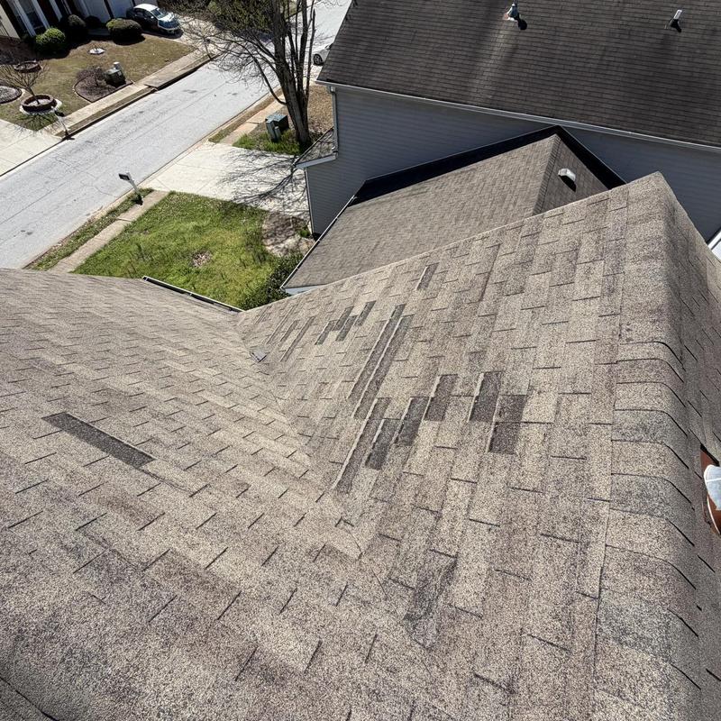 Pipe boot and shingles on roof in Loganville, GA