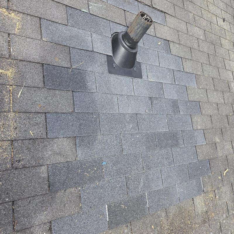 Pipe boot and shingle replacement on asphalt roof