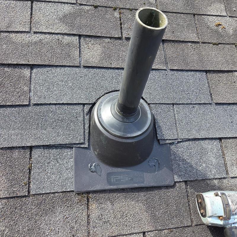 Pipe boot flashing on asphalt shingle roof