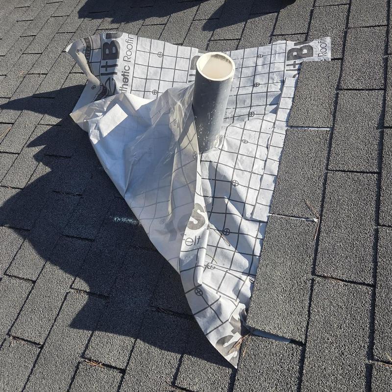 Pipe boot with underlayment on shingle roof