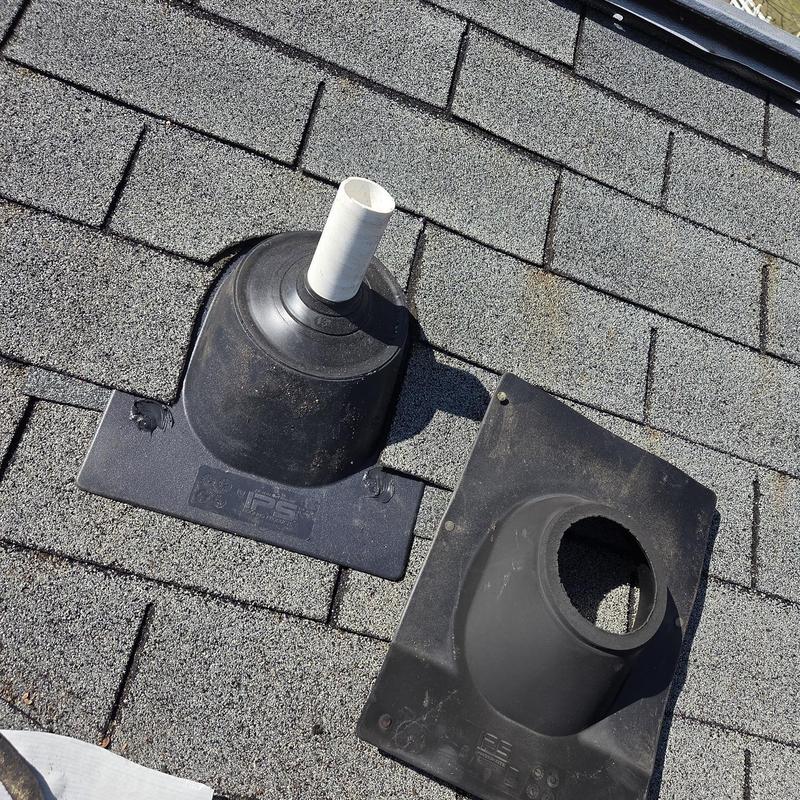 Pipe boots on shingled roof during replacement job