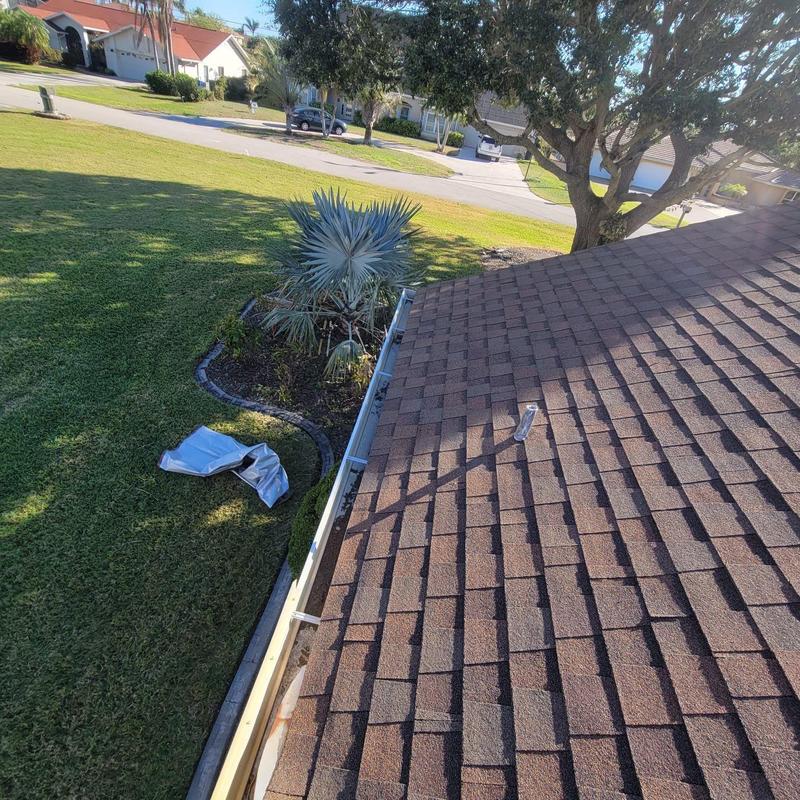 Shingle roof and gutter cleaning in Ft. Myers, FL