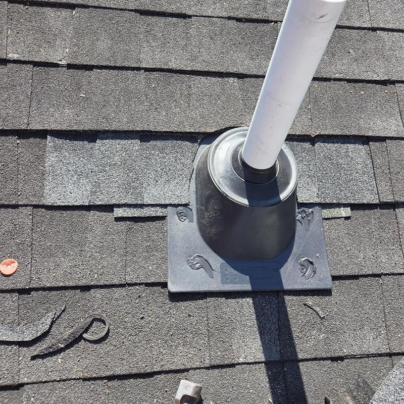Pipe boot and shingle roof corner replacement with rain cap