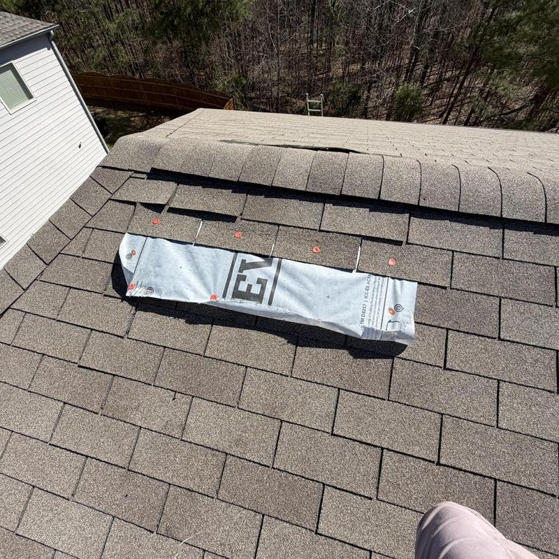 Shingle roof patch with underlayment and ridge vent