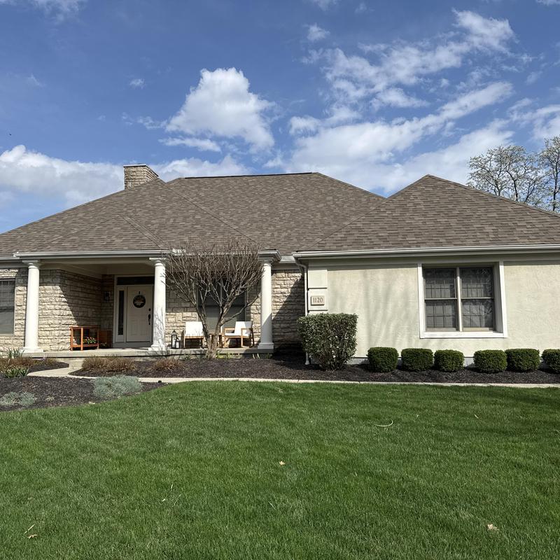 Malarkey Vista asphalt shingle roof on suburban house Malarkey Vista asphalt shingle roof on suburban house