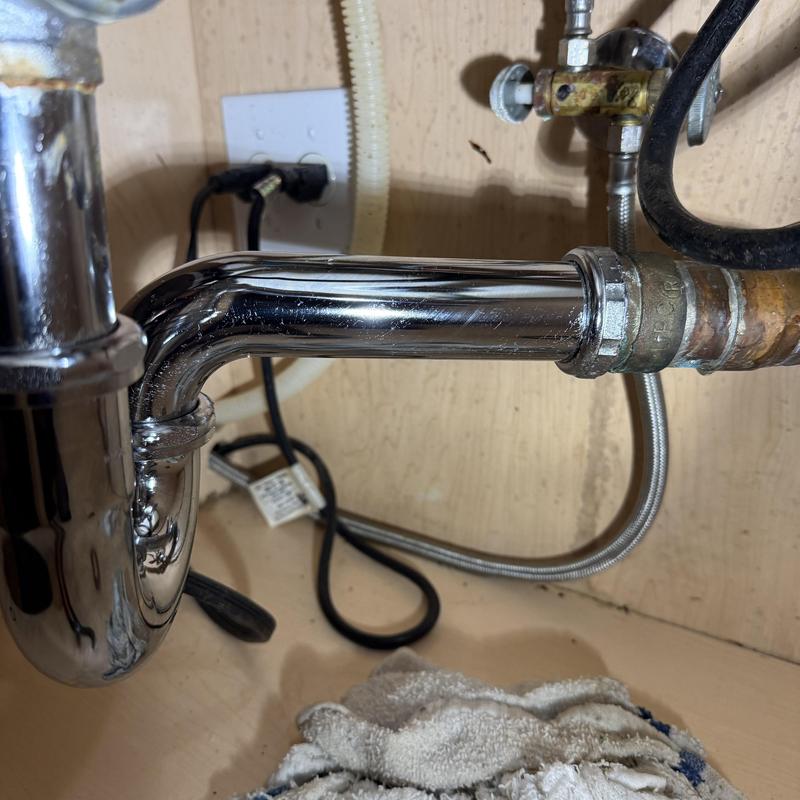 Kitchen sink P-trap and drain pipe replacement under cabinet