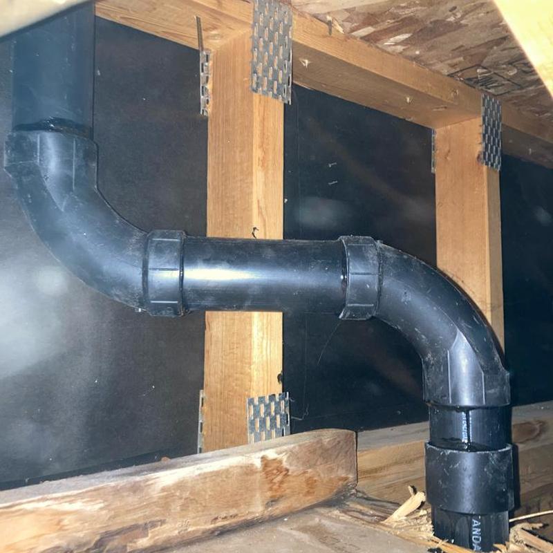 2-inch kitchen ceiling drain line with pipe fittings