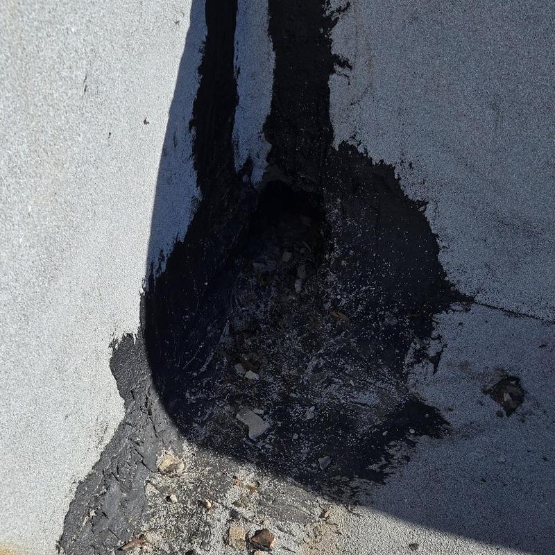 Flat roof membrane with hail storm damage patch