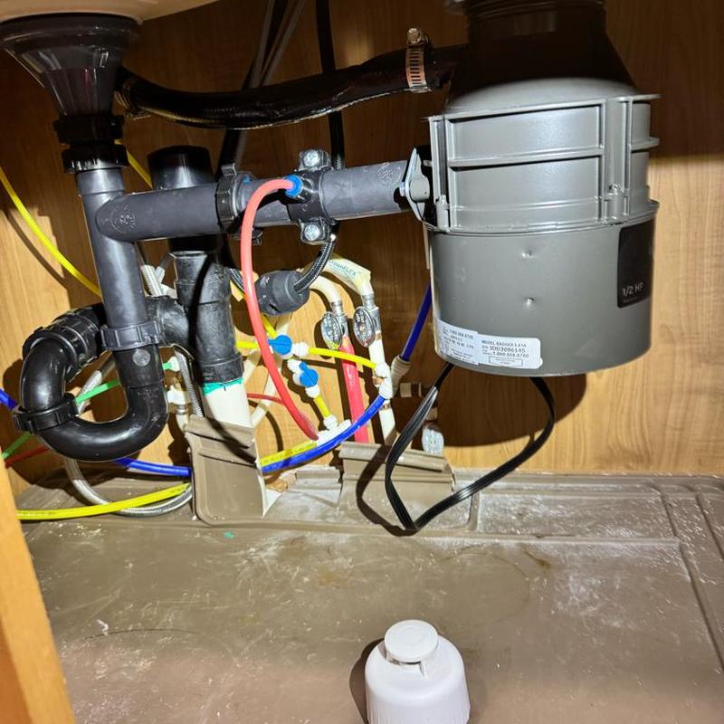 Garbage disposal and kitchen faucet plumbing installation