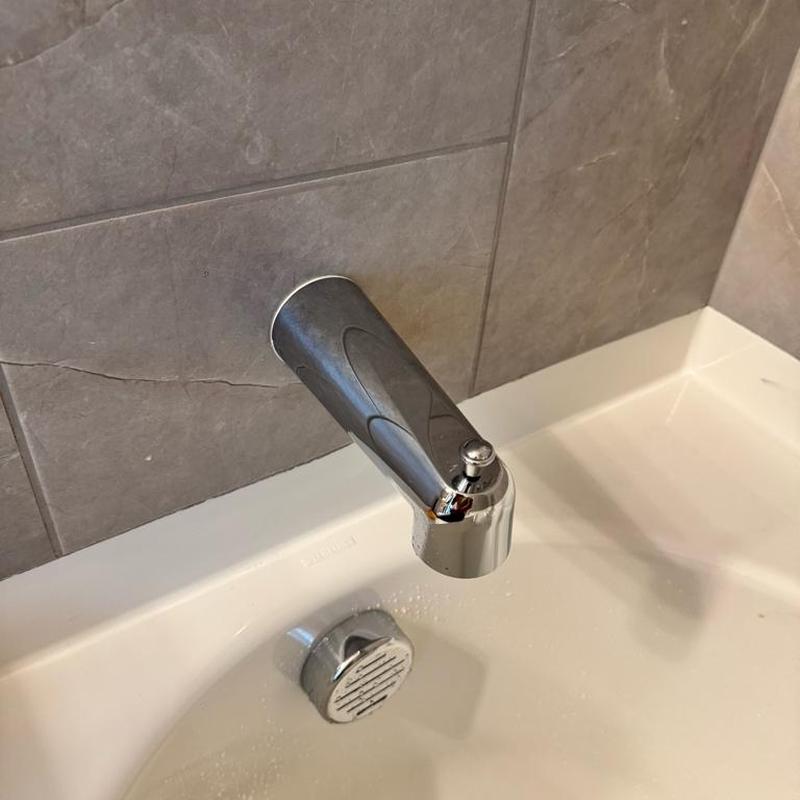 Tub spout and diverter valve installation in bathtub