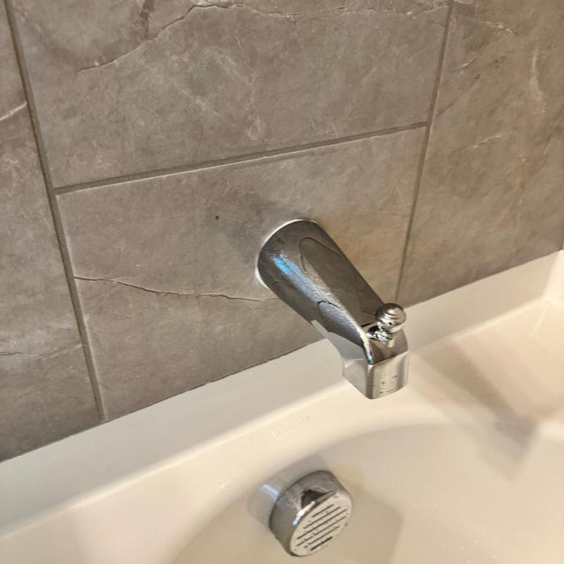 Tub spout with diverter replacement in bathroom