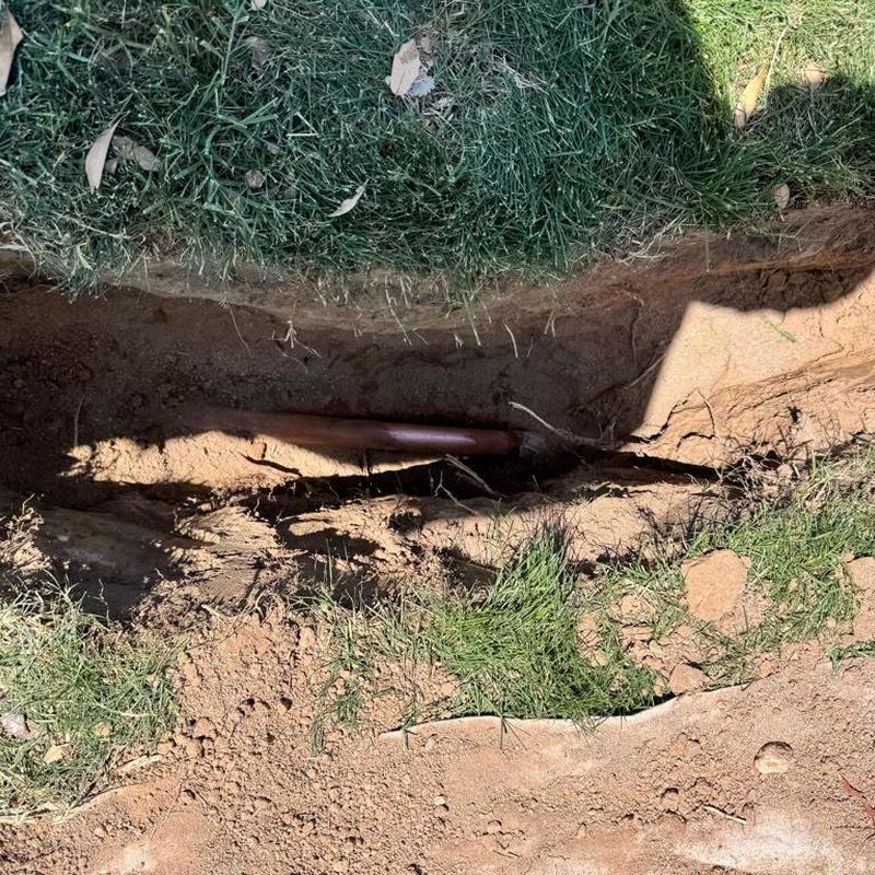 Main waterline with exposed copper and PEX piping