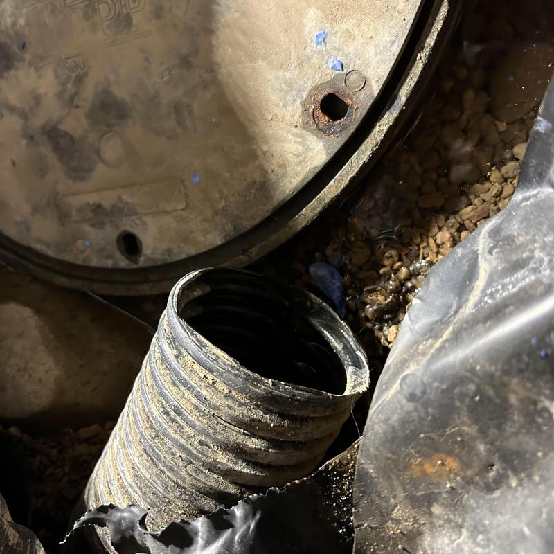 Sump pump discharge pipe incorrectly routed in crawlspace Sump pump discharge pipe incorrectly routed in crawlspace