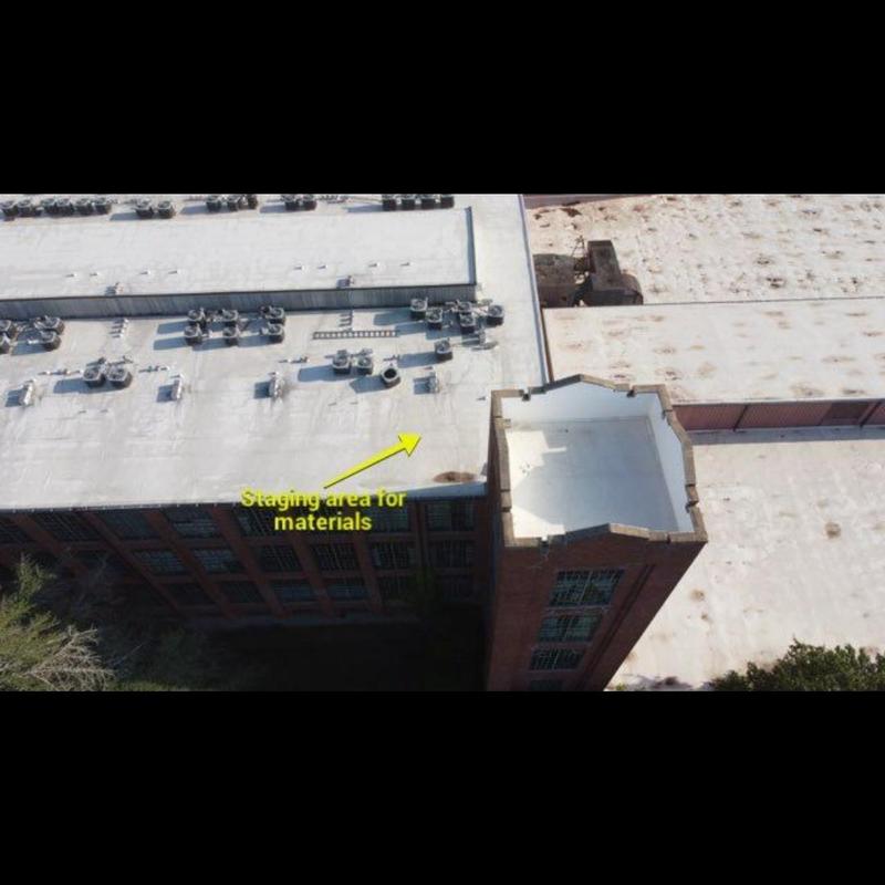 Flat commercial roofing with HVAC units and staging area Flat commercial roofing with HVAC units and staging area