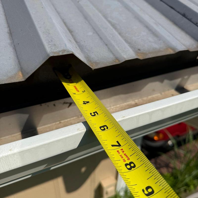 Corrugated metal roof panel measurement with tape