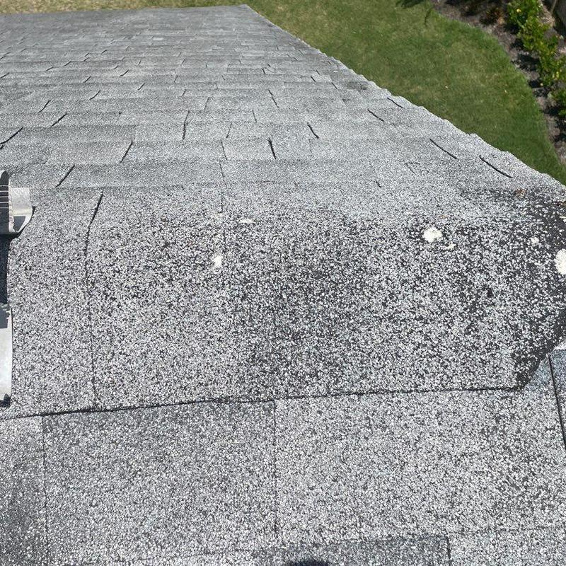 Shingle roof with damaged and deteriorated shingles