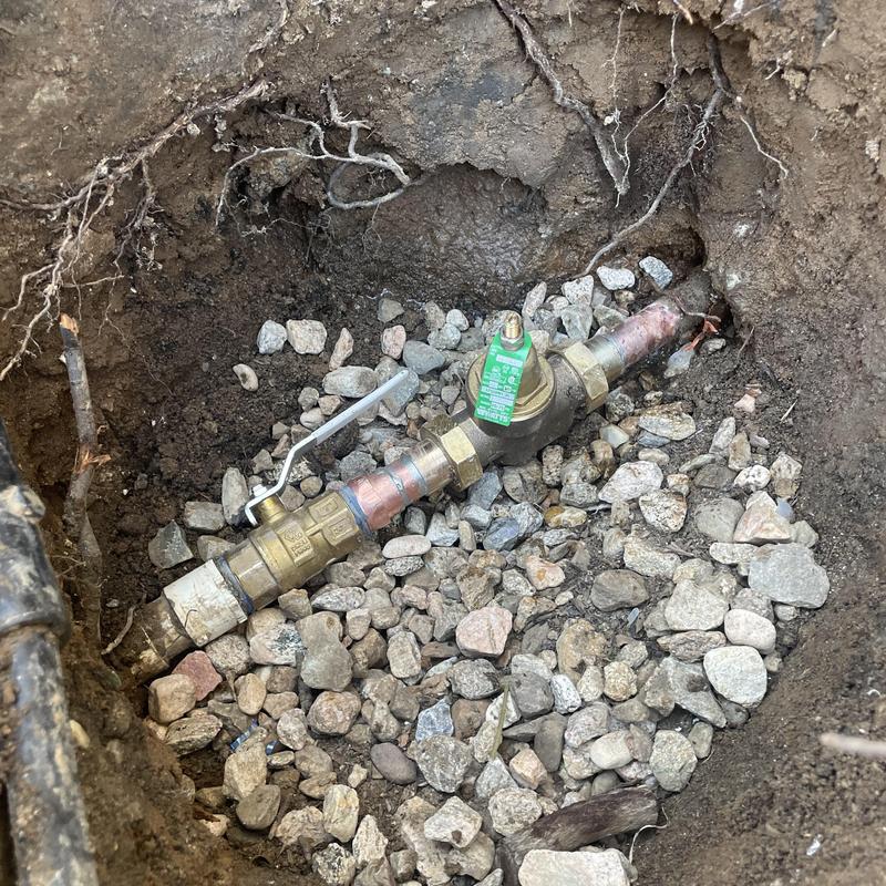 Pressure reducing valve with shut off valve in dirt pit