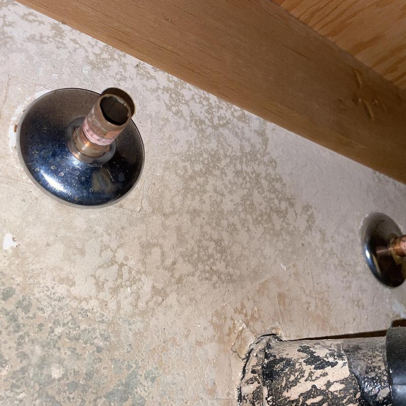 Bathroom sink copper water supply valves removed with corrosion