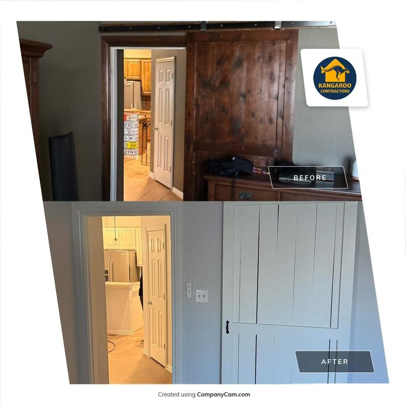 Wooden sliding barn door painted neutral white finish