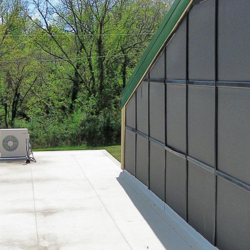 Metal exterior wall panels on commercial building