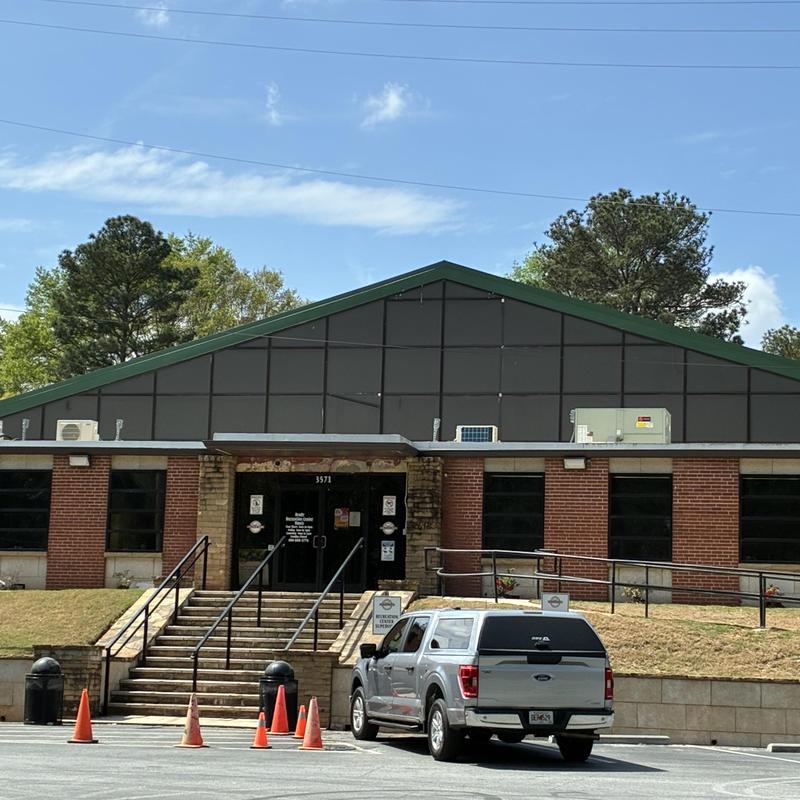 Exterior metal wall panels on commercial building facade