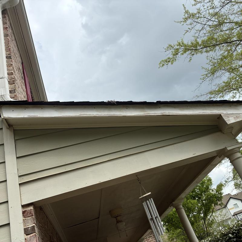 Horizontal siding panels on porch fascia and trim