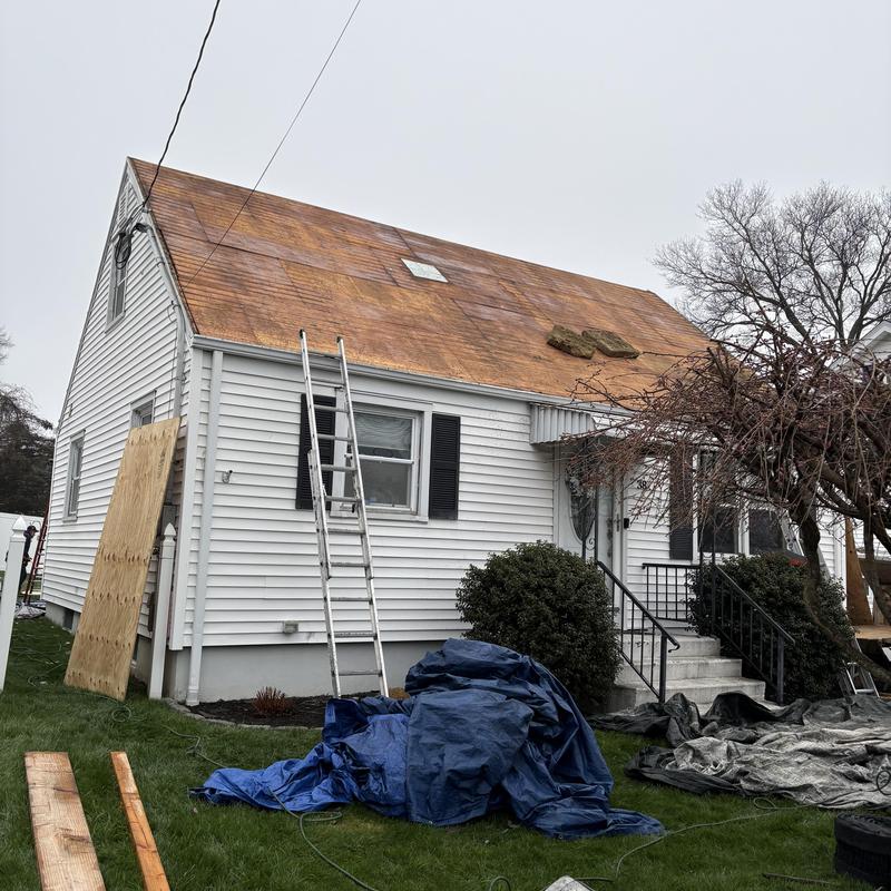 Plywood roof decking replaced on residential house