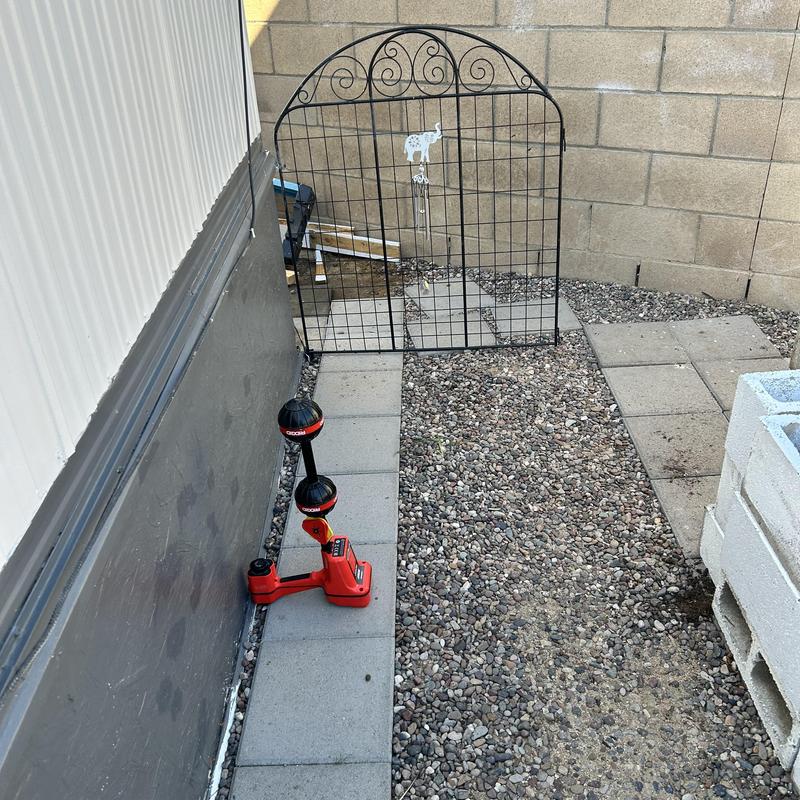 Drain line with inspection equipment and gravel path