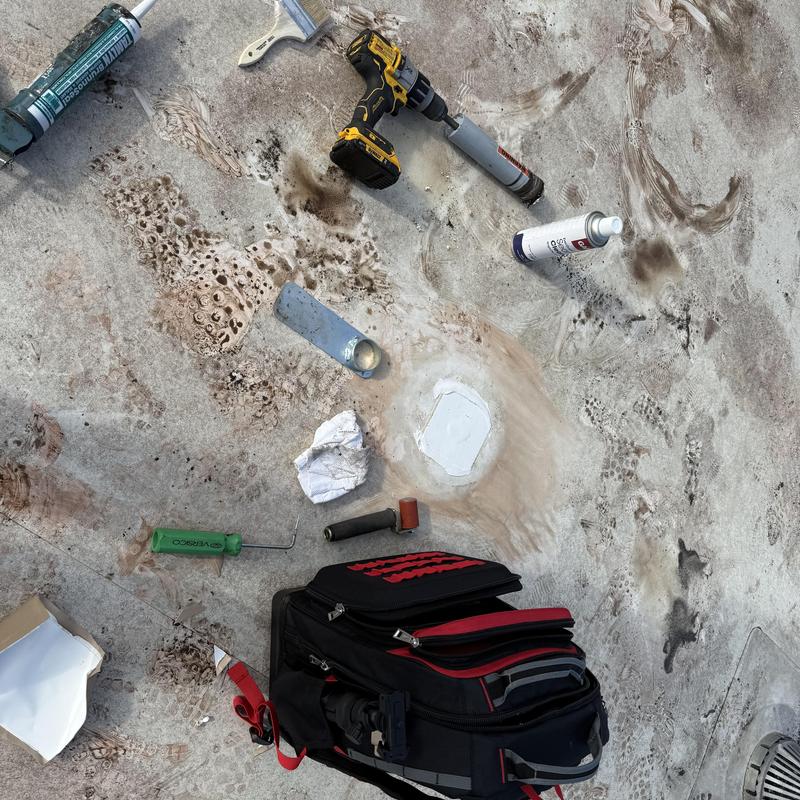 TPO roofing membrane patch with tools and sealants