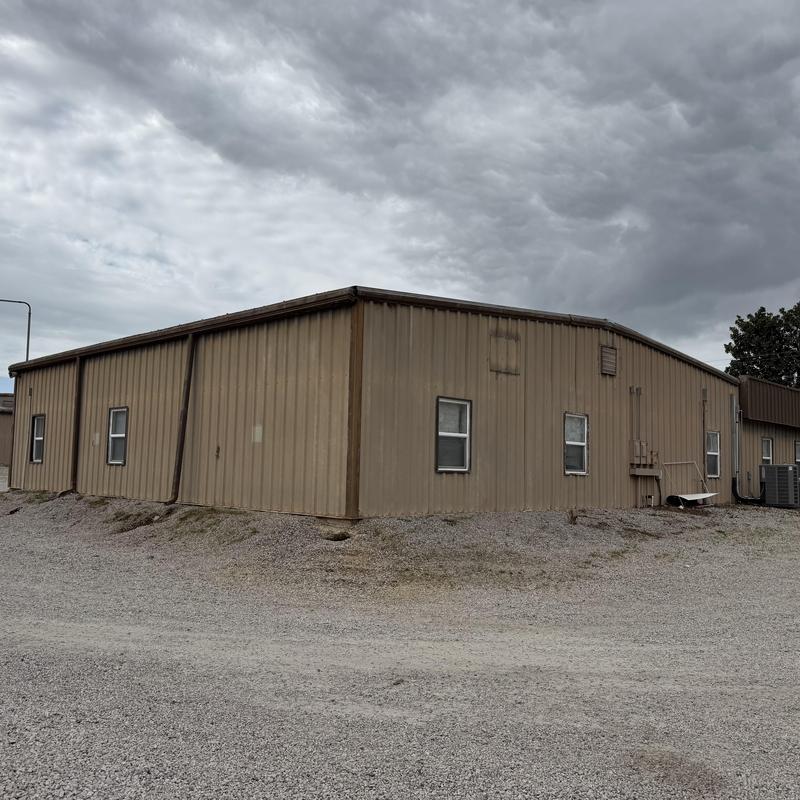 Metal roof and drainage system on commercial building