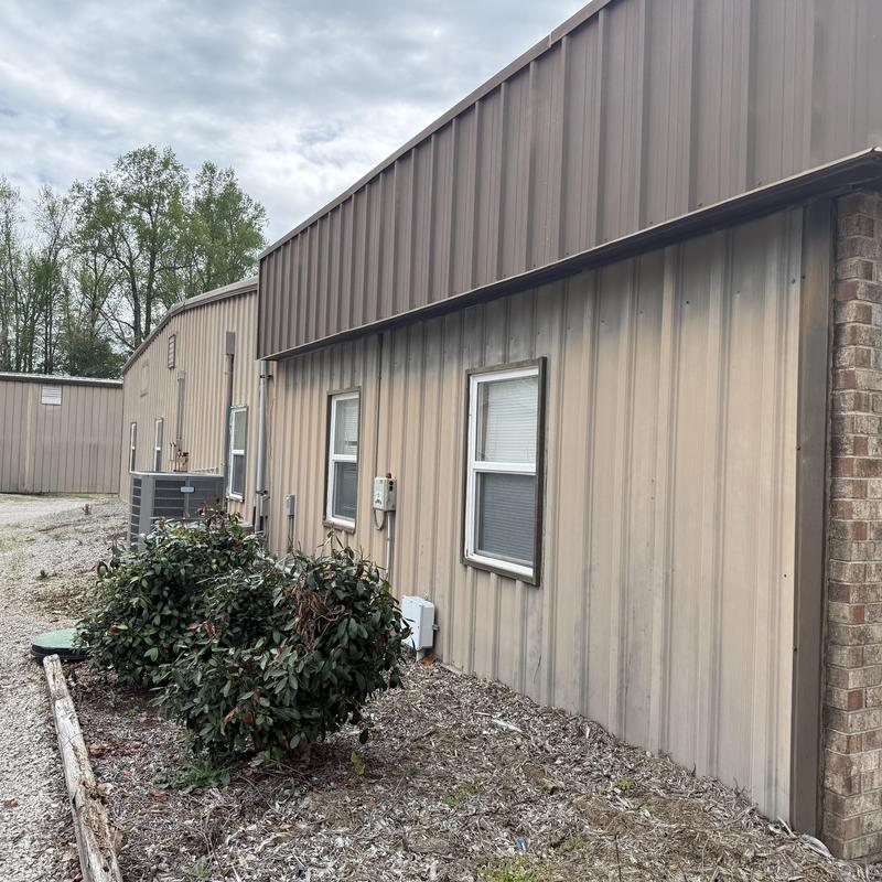 Metal roof exterior wall and HVAC unit installation